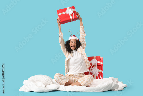 Excited young woman in paja...