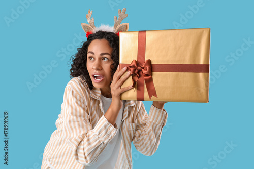Surprised young woman with ...