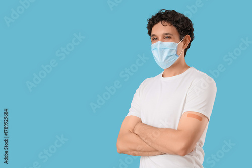 Young man in medical mask a...