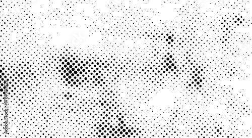 Black and gray halftone pattern with circular dots creating gradient effect