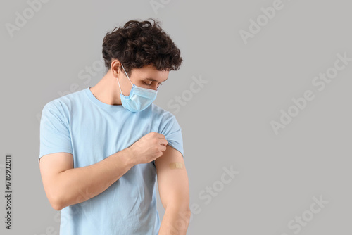 Young man in medical mask a...