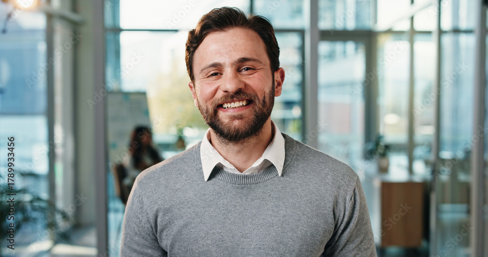 Naklejka premium Smile, professional and portrait of business man in office for about us, confidence and brand manager. Happiness, pride and campaign opportunity with person in marketing agency for creative startup