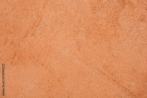 Wallpaper Mural A full frame, close-up view of a soft orange-brown suede or microfiber textile with an uneven, slightly brushed texture Torontodigital.ca