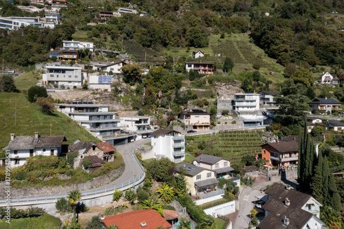 Aerial view of a group of houses in Switzerland in a mountainous part of the south of the country