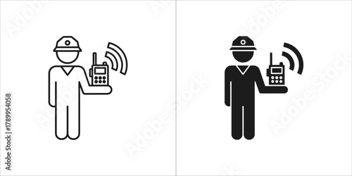 Person with hard hat holding a walkietalkie with wifi signal