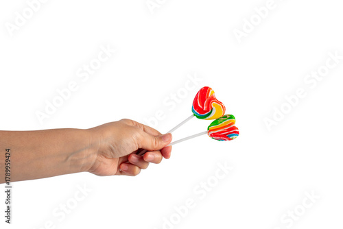 Sweets, lollipops in hand, on transparent background