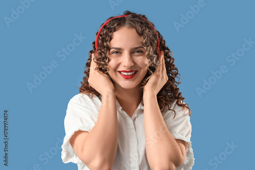 Young woman in headphones l...