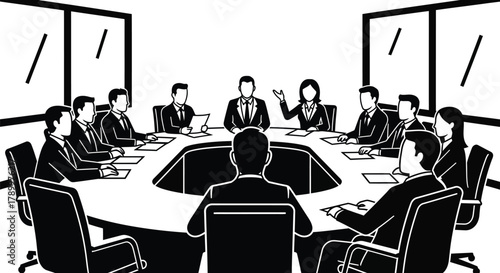 Business team collaborating during board meeting in modern boardroom
