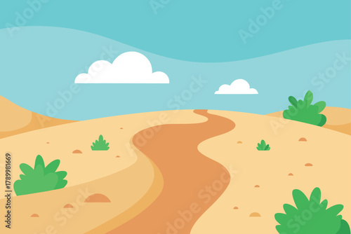 Winding path through sandy desert landscape under a clear blue sky with clouds