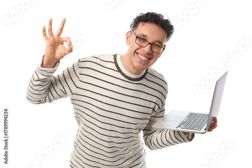 Young man with laptop showi...