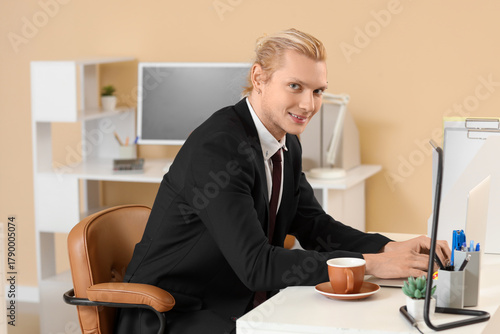Young businessman working w...