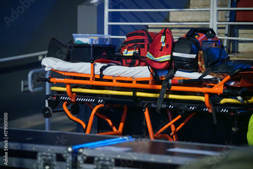 Medical paramedic equipment placed backstage during a concert event for emergency response and safety support of crew and performers