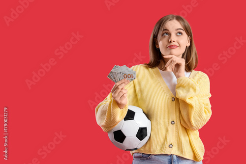 Thoughtful young woman with...