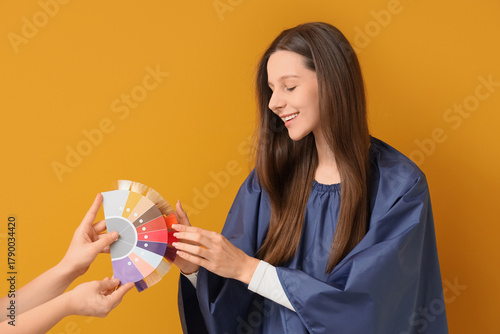 Young woman and female hand...