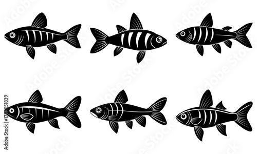 Elegant black and white fish collection, originally a vector graphic, perfect for logos, icons, and designs needing a simple, aquatic touch