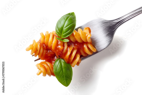  silver fork seen directly from above, holding a small twirl of fusilli pasta covered in glossy tomato sauce