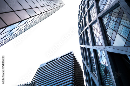 Modern architecture skyscraper in Paris with angular glass facade and corporate reflection structure under clear sky showing urban design and contemporary city innovation