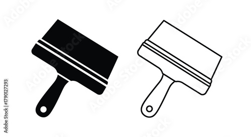 Two paint scrapers one black and one white displayed side by side