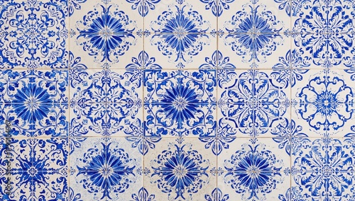 Typical blue Sicilian or azulejo tin-glazed ceramic tiles featuring various intricate designs, decorative flooring and wall enhancement