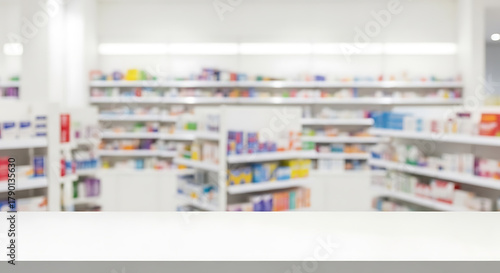 Wallpaper Mural White counter or table in front of blurred medicine shelves at the pharmacy store, suitable for product display. Torontodigital.ca