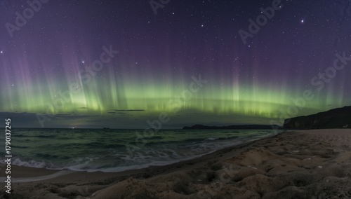 Fototapeta Naklejka Na Ścianę i Meble -  The northern lights illuminating the Baltic Sea, seasonal change