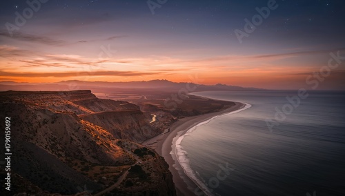 Coastal road at sunset near a natural park, highlighting erosion risk