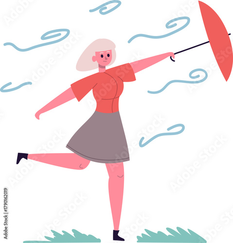 Woman struggling holding umbrella during windy weather