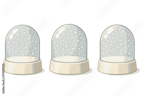 Three empty glass snow globes with falling white particles inside