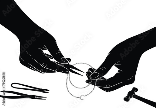 artisan hands creating a silver necklace