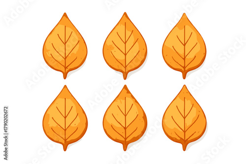 Golden brown autumn leaf shaped cookies arranged in a decorative pattern