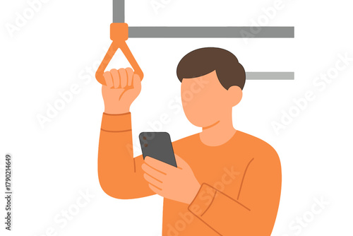 Young adult male passenger commuting on public transport holding strap and checking mobile phone