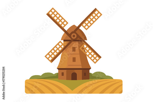 Traditional wooden windmill with large sails standing in a cultivated golden agricultural field