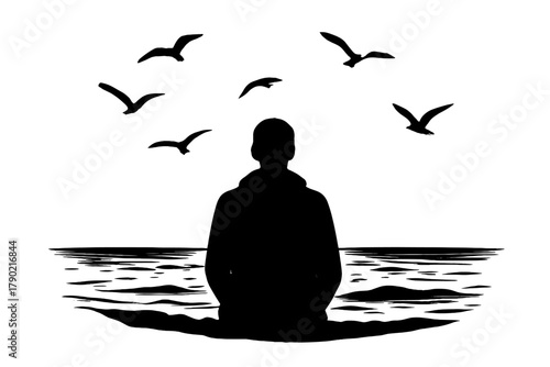 Monochrome silhouette of a person sitting by the water watching a flock of birds flying overhead