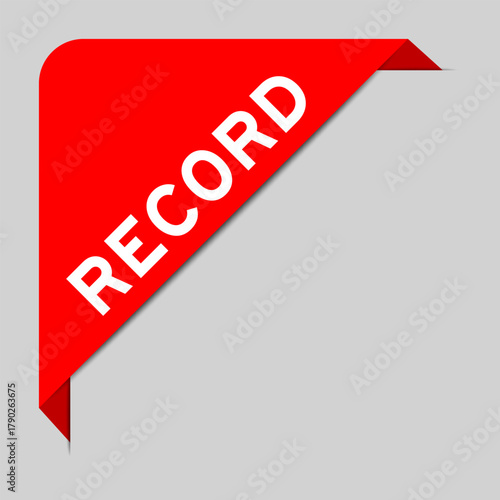 Red color of corner label banner with word record on gray background