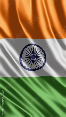 Waving Indian tricolor flag with Ashoka Chakra closeup.