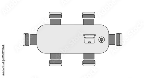 Simplified workspace overhead view with collaborative table and laptop offering flexible office