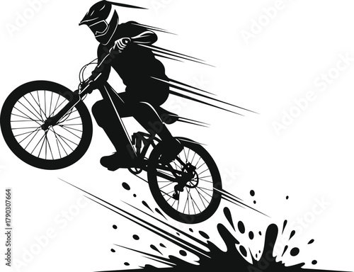 Dynamic silhouette of a mountain biker performing a jump