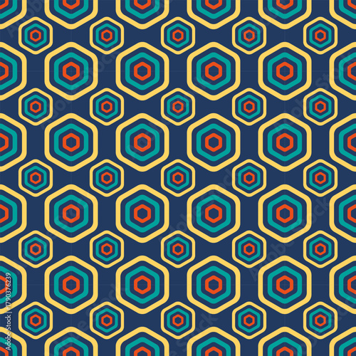 A seamless geometric design featuring concentric muiti-color hexagons on a dark navy background. Rainbow Seamless Texture Style. Vector illustration