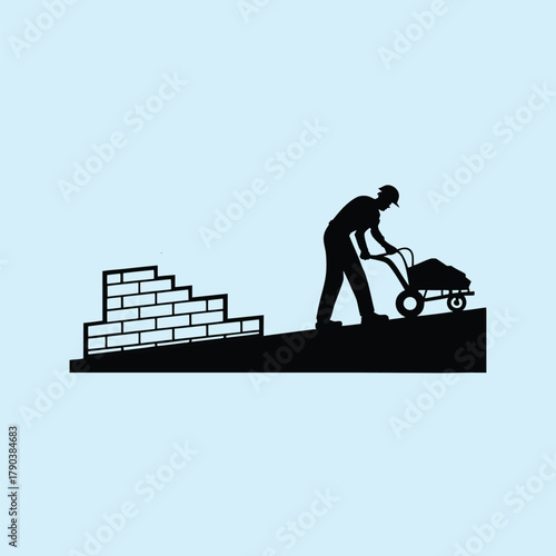 A silhouette of a construction worker on a roof with a shovel shows a person at work on a business site