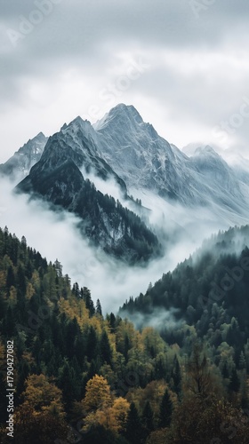 Majestic Mountains Rise Above Misty Valleys With Autumn Colors in a Peaceful ...