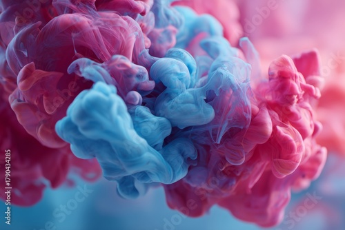 Swirling Colors of Pink and Blue Create a Vibrant Cloud Effect in a Serene En...