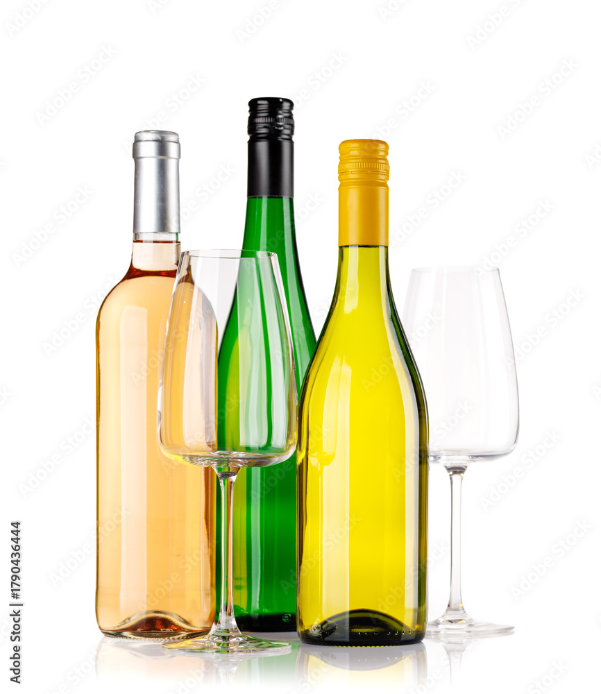 Naklejka premium Different wine bottles and glasses on white background