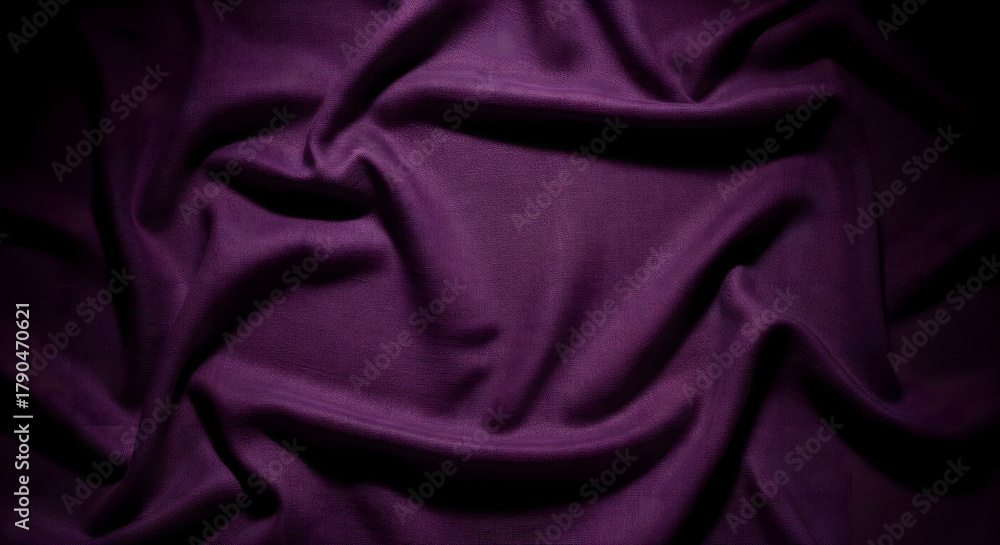 Fototapeta premium Deep Purple Fabric Folds with Dramatic Lighting and Shadows