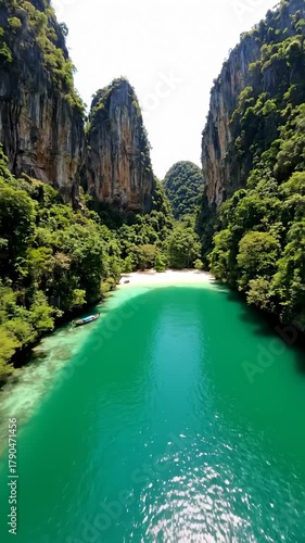 Aerial View of Turquoise Water With Cliffs and Forest in Thailand