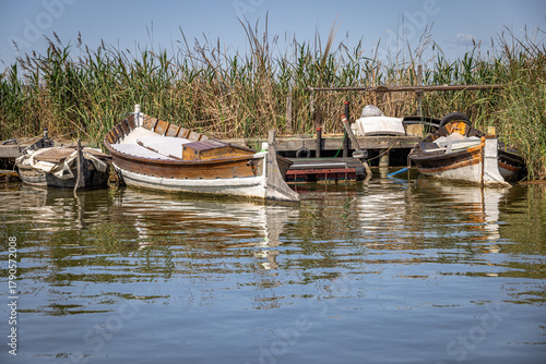Boats  on the lake in Parque Natural de la Albufera, Valencia, Spain