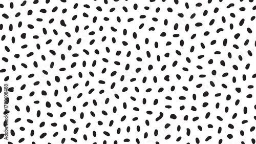 Black organic shapes scattered on white background