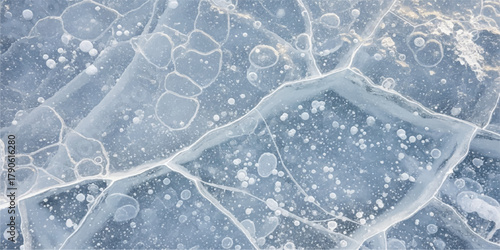 Abstract white and blue frost pattern on a window texture, featuring bright crystal snowflakes of the cold winter season