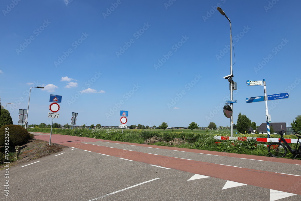 Obraz premium Camera surveillance on the dike along the ring canal Zuidplaspolder to prevent driving here