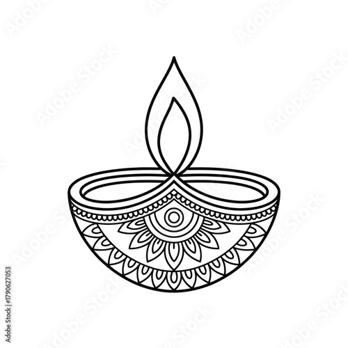 Traditional indian diya oil lamp with decorative mandala pattern