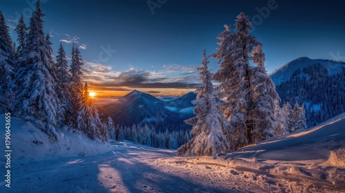 Majestic winter mountain landscape at sunset with snow covered pine trees and dramatic sky